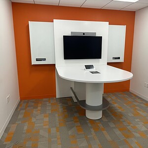 Modern Cube World USA Media Scape collaboration station with TV and whiteboards.