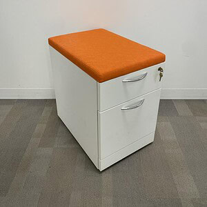 Orange Steelcase mobile pedestal with lockable drawers for office storage.