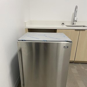 Summit Commercial 24-inch undercounter refrigerator, ideal for commercial kitchens and food storage.