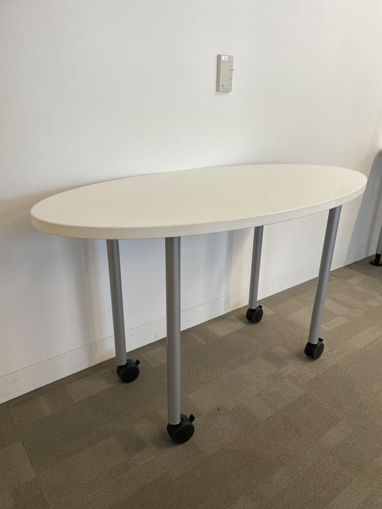 Steelcase white 4x2 oval table on casters