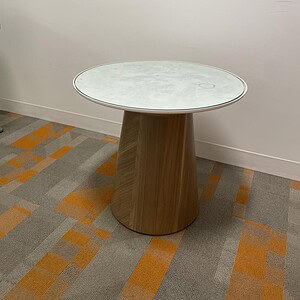 Steelcase Campfire 24-inch round glass table for modern office or lounge spaces.
