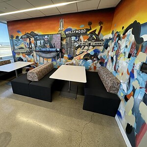 Steelcase banquet seating 72in wide in vibrant office lounge setting.