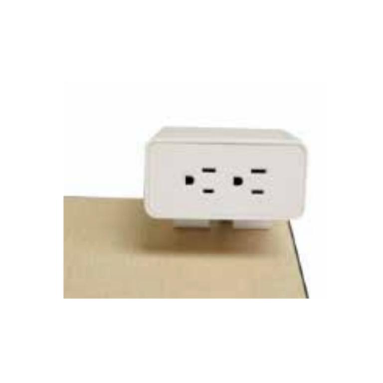 Power module wall outlet with multiple sockets for desktop power needs.