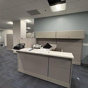 Modern Ethospace reception desk in an office environment.