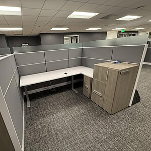 Modern office cubicle with Knoll Reff Autostrada 8x6x65 HAT desk and storage cabinet.