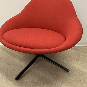 Modern Allermuir styled four-leg bucket lounge chair in vibrant red.
