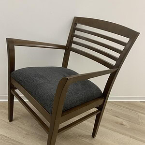 Knoll Studio veneer chair with slit back and grey upholstered seat, stylish and comfortable for offi.