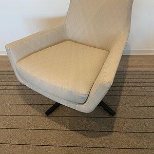 OFS Neutral Designer Lounge Swivel Chair with modern design, perfect for office or lounge spaces. Co.