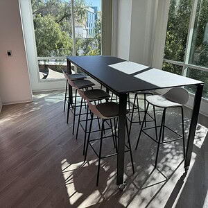ERG Bar Top Black Steel Table - 96x36x42 inches for modern commercial spaces.
