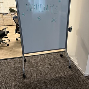 Mobile whiteboard with 72x36 inch surface, ideal for meetings and presentations.