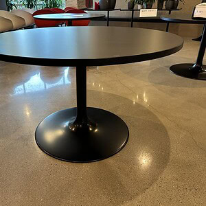 ERG 36-inch round grey top table with black base, ideal for modern office or conference room setting.