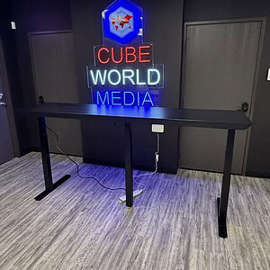 Cube World USA neon sign for media and entertainment industry.