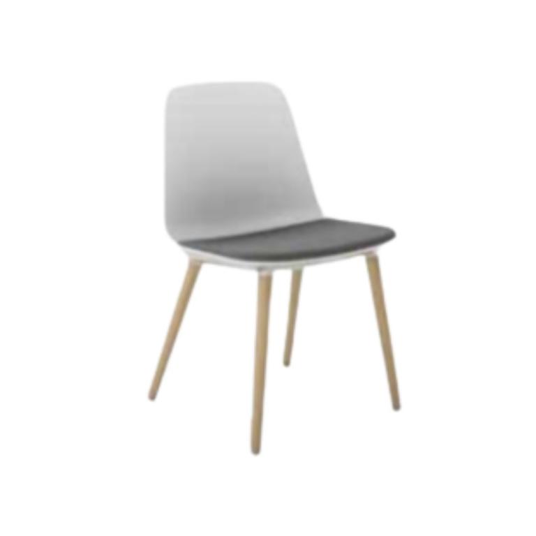 Upholstered dining chair with wooden legs, modern design, perfect for home or office.