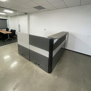 Ethospace 5x6 reception desk with a 4-inch tall profile, ideal for modern office reception areas.