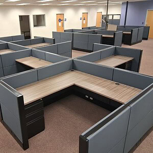 Office cubicles with charcoal and black panels for a professional workspace.