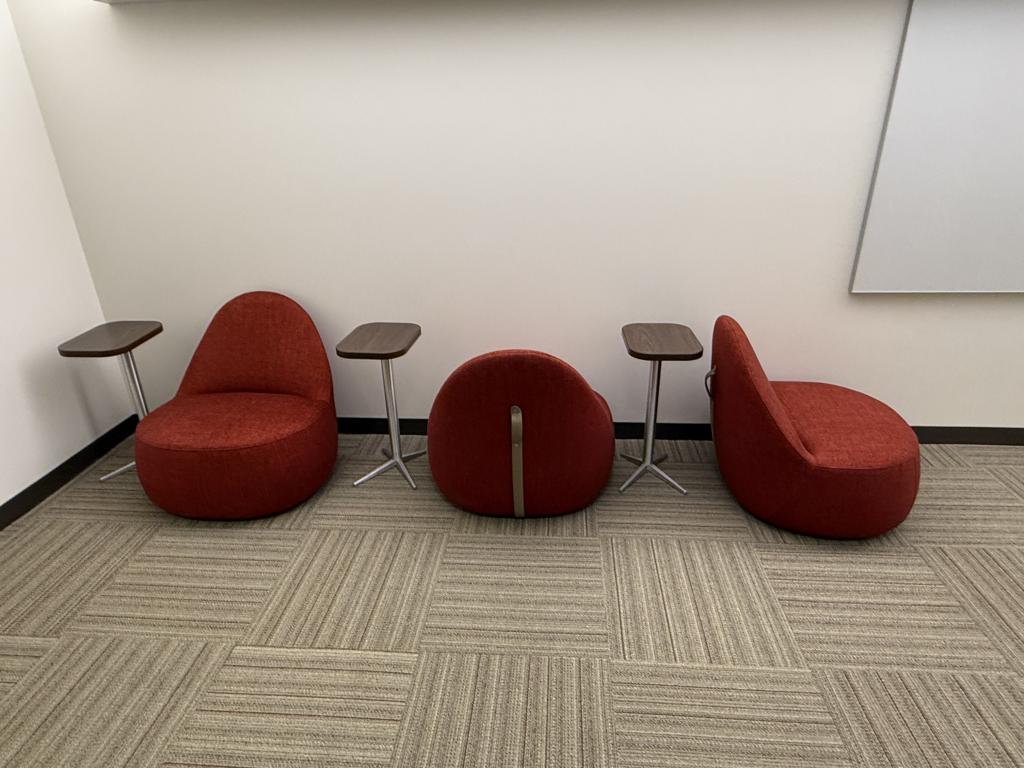 Kimball red low egg chair on casters