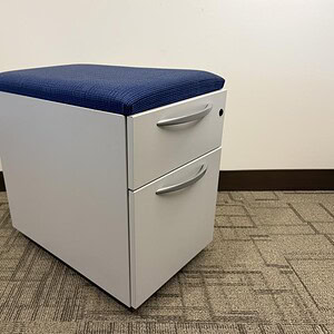 Kimball silver and blue mobile pedestal with two drawers for office storage.