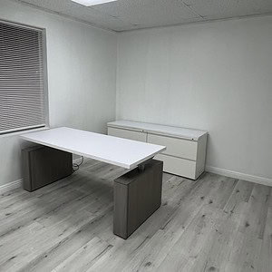 Elegant office furniture setup with a Knoll Executive 6ft HAT Desk and matching credenza for profess.