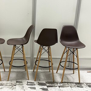Modern Eames-inspired wine bar stools with wood legs, perfect for stylish home or commercial bar set.