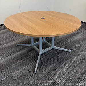 Haworth Sun Star base table with adjustable tops, ideal for versatile office or conference room setu.