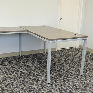 Shaped Boss Simple desk for office use, available in 5x5 or 6x6 sizes with customizable options.