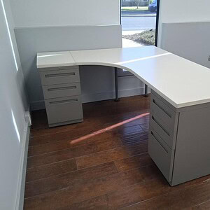 Modern Miller Knoll double pedestal desk with ample storage, ideal for office workspaces.