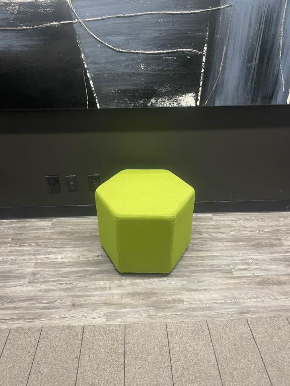 Hightower green fabric ottoman