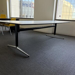 Signature 9x3.5ft Allsteel conference table for modern office spaces.