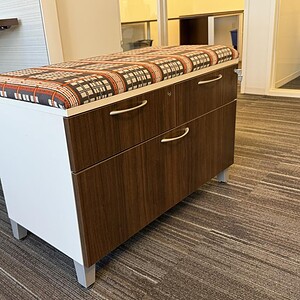 Lateral file cabinet with removable top, 36" wide, 18" deep, 25" tall, in a modern office setting.