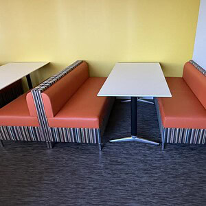 Breakroom meeting tables with booth seating for casual dining or team discussions. Perfect for offic.