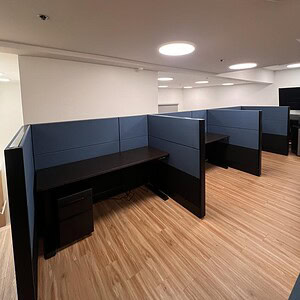 Modern Ethospace Midnight HAT cubicles with privacy panels in an office setting.