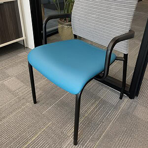 Blue and grey modern guest chair with armrests, ideal for office reception or waiting areas. Stylish.