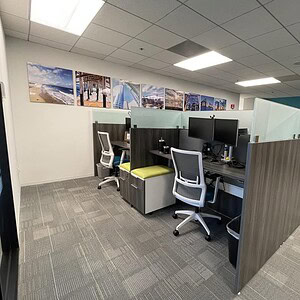 OFS Modern HAT Bench 6x3 in an office workspace with cubicles and ergonomic chairs.
