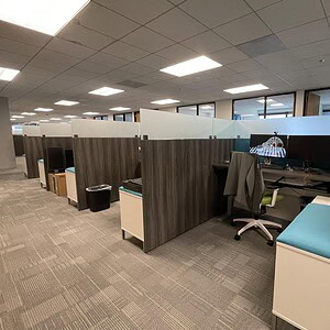 OFS Modern HAT Cube 6x6 workstation with privacy panels and ergonomic seating.