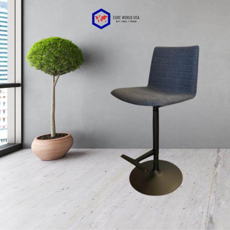Modern black woven back stool with adjustable height for office or home use.