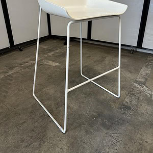 Counter height white stool with a modern design, ideal for office or home use.