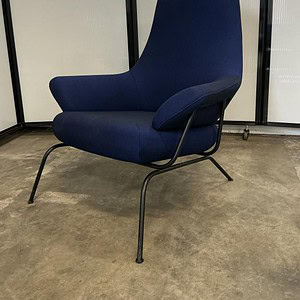 Navy blue luxury lounge chair with black steel base, perfect for modern office or reception areas.