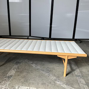 OFS Cream fabric upholstered wood bench with a modern design, perfect for living rooms or entryways.