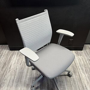 Grey SitOnIt Wit midback office chair for ergonomic comfort and support.