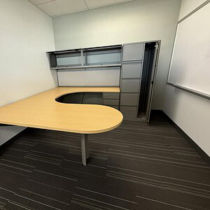 Executive desk with white oak finish and modern design.
