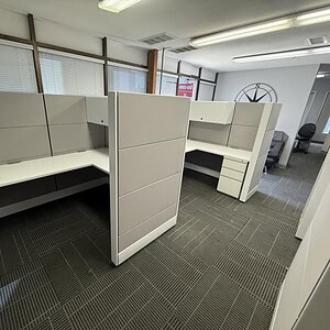 Modern Ethospace cubicles with customizable finishes for office spaces.