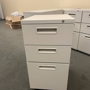 Herman Miller freestanding pedestal with top, ideal for office storage and organization.