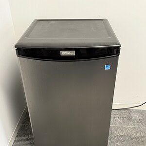 Mini Fridge with Stainless Steel Finish for Compact Spaces.