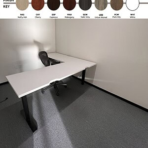 Office desk with L-shape design, available in 7 finishes, featuring a black base, ideal for modern w.