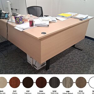 OFS HAT L-shaped desk with double modesty panel, available in 7 finishes, perfect for modern office.