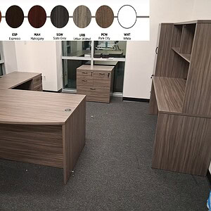 Office furniture with a stylish bowfront desk and matching storage units for organized workspace.