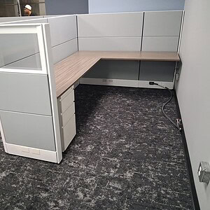 Ethospace 6x6x54T office cubicle with urban walnut tops and gray panels.