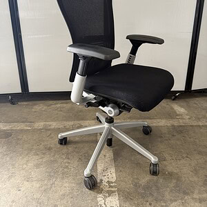 Haworth Zody black fabric ergonomic office chair with silver frame.