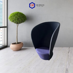 Modern black swivel chair with purple cushion in minimalist office setting.