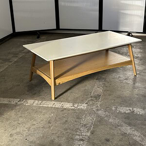 White top with a natural maple base, 4'x2'x18" coffee table.
